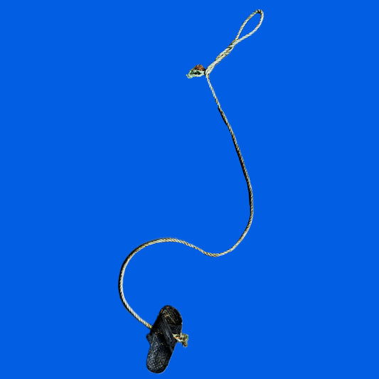 Contemporary sculpture featuring a cord with a single sandal, set against a blue background - 'Cord String with Sandals Within The Atlantik' by Lenfantvivant.